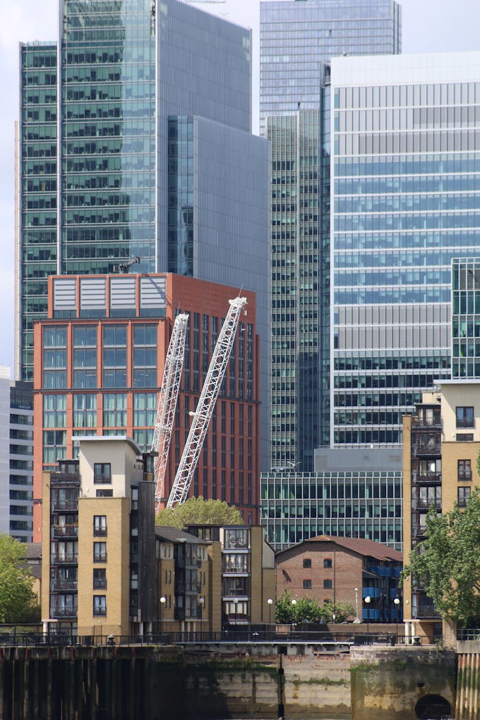 service-04 A cluster of modern skyscrapers dominate the financial district skyline.