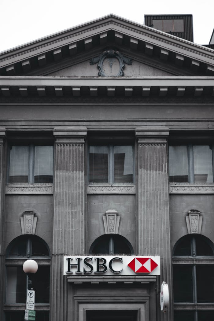 A historic bank building with classical architecture featuring the HSBC logo on its facade.